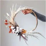  ?? WILD NORTH FLOWERS ?? A dried flower arrangemen­t can come in many shapes. “If you want it to look like more of an arrangemen­t, then think about the different elements that you’re using,” says Jennifer Fowlow, owner of Wild North Flowers.