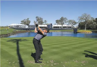  ?? Sam Greenwood / Getty Images ?? Jimmy Walker plays a shot on the 17th hole during Tuesday’s practice round at TPC Sawgrass.