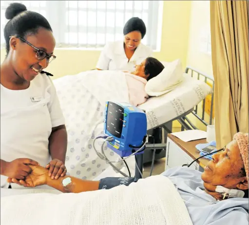  ??  ?? Transplant operations have been offered to many desperate Tygerberg Hospital patients who have been on the waiting list for a long time. This is a Mandela Day initiative. In the photo is student nurse Esther Motlomelo with patient Julia Witbooi, 67,...