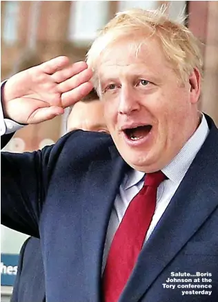  ??  ?? Salute...Boris Johnson at the Tory conference yesterday