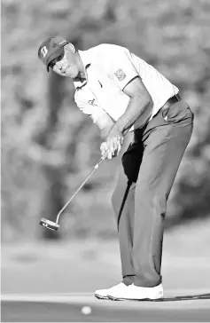  ?? - AFP photo ?? Matt Kuchar of the United States putts on the 17th green during the third round of the Sony Open In Hawaii at Waialae Country Club on January 12, 2019 in Honolulu, Hawaii.