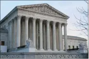  ?? PATRICK SEMANSKY - THE ASSOCIATED PRESS, FILE ?? The Supreme Court is taking up a first case about a federal law shielding Google, Twitter, Facebook and other companies from lawsuits over content posted on their sites by others.