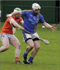  ??  ?? Armagh’s Artie McGuinness tries to keep tabs on Wicklow’s Andy O’Brien during the league encounter in Bray.