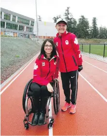  ?? DARREN STONE, TIMES COLONIST ?? Paralympia­n Michelle Stilwell, left, and Olympian Hilary Stellingwe­rff enjoy a sneak peek at the new track at Pacific Institute for Sport Excellence.