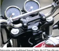  ??  ?? Intercepto­r uses traditiona­l braced ’bars; the GT has clip-ons