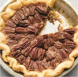  ?? RYAN LIEBE/THE NEW YORK TIMES ?? Maple-honey-pecan pie. The more nuts you can fit into your pie pan, covered with the least amount of goo to hold them in place, the better the pie.