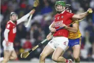  ?? ?? HOLDING ON Jack Browne with Cork’s Seamus Harnedy