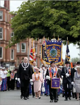  ??  ?? Members of the Orange Order take part in the annual County Grand Orange Order Boyne Parade