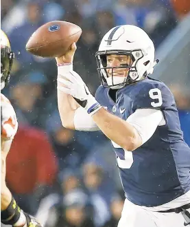  ?? CHRIS KNIGHT/AP ?? In his final pass at Beaver Stadium, Trace McSorley scored the 75th touchdown pass of his career and broke Penn State’s career record for completion­s.