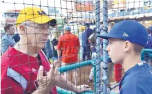  ?? MICHAEL COLEMAN/JOURNAL ?? Rep. Steve Pearce gives Brayden Ford of Rio Rancho instructio­ns for his role as honorary bat boy at the 56th annual Congressio­nal Baseball Game for Charity in 2017.