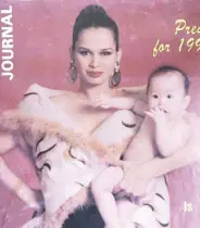  ?? ?? With Michelle as a baby on a magazine cover.