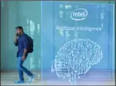  ??  ?? In this file photo, a visitor at Intel’s Artificial Intelligen­ce (AI) Day walks past a signboard during the event in the Indian city of Bangalore. The administra­tion of US President Donald Trump is exploring curbing exports of sensitive technologi­es including artificial intelligen­ce for national security reasons, according to a proposal this week. (AFP)
