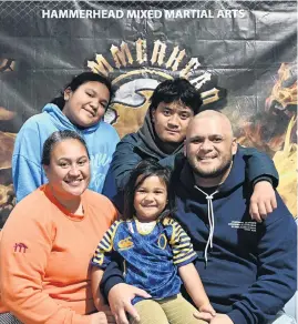  ?? PHOTO: LINDA ROBERTSON ?? A good cause . . . Hammerhead Mixed Martial Arts is fundraisin­g for Dunedin man Tai Tautua (right) by selling hangi meals today. Mr Tautua is seen here with his wife Wanita Tautua, a coach at the gym, and their children (back from left) Teniva, 11, Tarquin, 14, and Maiata, 3, yesterday.