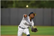  ?? DANNY KARNIK/GEORGIA TECH ATHLETICS ?? Tech freshman pitcher Marquis Grissom Jr., whose father was part of the Braves’ 1995 World Series-winning team, allowed three runs on three hits and two walks in his college debut Tuesday.