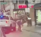  ?? VIDEO IMAGE. ?? An image taken from a cellphone video posted to social media Nov. 28, 2019, shows a Chicago police officer slam a man to the ground after he allegedly spit on the officer in Chatham.