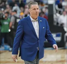  ?? Sebastian Foltz/Post-Gazette ?? Kentucky coach John Calipari walks off the court following Kentucky’s loss to Oakland in the first round of the NCAA tournament on March 21 at PPG Paints Arena. Calipari reportedly taking the job at Arkansas.
