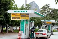  ?? — AFP ?? Drastic cost-cutting and higher well productivi­ty helped offset weaker revenue at Petrobras.