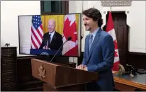  ?? CP PHOTO ADRIAN WYLD ?? Prime Minister Justin Trudeau and U.S. President Joe Biden smile as they say farewell following a virtual joint statement in Ottawa on Tuesday.