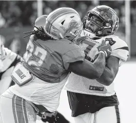  ?? Photos by Brett Coomer / Staff photograph­er ?? As the Texans’ top 2019 draft pick, Tytus Howard, right, looms as the X-factor for an offensive line that remains a work in progress.