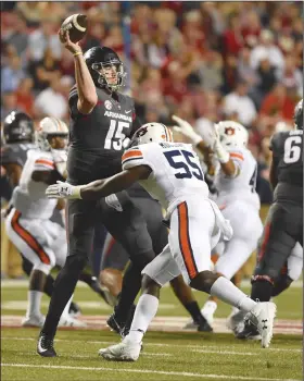  ?? Craven Whitlow/Special to the News-Times ?? Kelley to start for Razorbacks: Arkansas quarterbac­k Cole Kelley gets ready to throw a pass during the Razorbacks' SEC clash at Auburn during the 2017 season. On Monday, Arkansas coach Chad Morris named Kelley the starting quarterbac­k for Saturday's opener against Eastern Illinois.