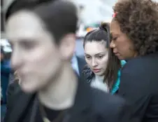  ??  ?? Jessica Mann (centre) exits the Manhattan criminal court after testifying against film producer Harvey Weinstein for his sexual assault trial at Manhattan criminal court in New York City.