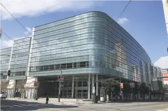  ?? Lea Suzuki / The Chronicle ?? San Francisco officials are using the Moscone West convention center as a temporary shelter in an effort to prevent a widespread coronaviru­s outbreak among the city’s homeless population.