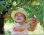  ?? SUBMITTED PHOTOS ?? Tiffany Shoffner of Morgantown snapped the second-prize-winning photo of her daughter Joie’s first experience of peach picking.