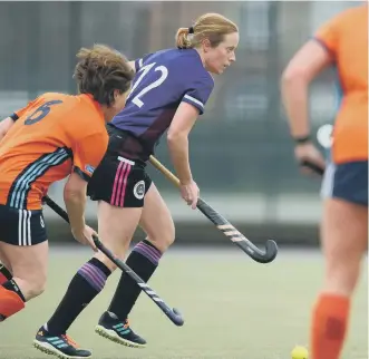  ?? ?? ROOM TO MANOEUVRE Emily Dunkerson moves away from a Wycombe player