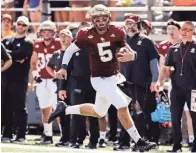  ?? WINSLOW TOWNSON/USA TODAY SPORTS ?? Boston College quarterbac­k Phil Jurkovec (5) runs against Colgate during the second half on Saturday.