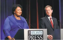  ?? John Bazemore / Associated Press ?? Stacey Abrams, the Democratic candidate for Georgia governor, assailed the probe begun by her opponent, Brian Kemp.