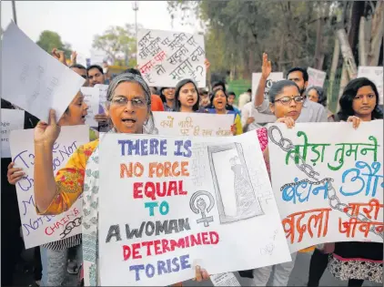  ?? AP PHOTO ?? Indian women participat­e in a rally to mark Internatio­nal Women’s Day in Allahabad, India, Thursday