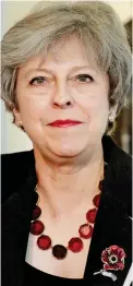  ??  ?? NHS tribute: Theresa May