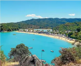  ??  ?? The stunning Kaiteriter­i Beach was a bucket-list destinatio­n that was fulfilled during a family holiday.