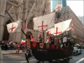  ?? MARTY LEDERHANDL­ER — THE ASSOCIATED PRESS FILE ?? A model of the “Santa Maria,” one of Christophe­r Columbus’ three ships, is pulled up New York’s Fifth Avenue in front of St. Patrick’s Cathedral during the 56th Columbus Day Parade. A movement to abolish Columbus Day and replace it with Indigenous...