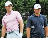  ??  ?? Rory McIlroy (left) and Brooks Koepka