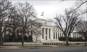  ??  ?? The US Federal Reserve building in Washington, DC. Even as the US central bank continues on its rate-hike path, the risk of capital flight from developing-nation assets has diminished, according to money managers.