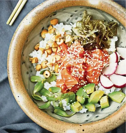  ?? — TNS ?? With a little prep, you can make your own poke bowls at home – or even throw a poke party, and let guests fill their bowls with the base, fish, toppings and sauce they prefer.