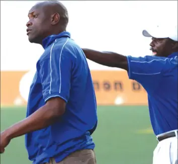  ?? ?? Lloyd “Samaita” Mutasa (left) and his assistant Masimba Dinyero barking instructio­ns on the touch line.