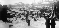  ?? NATIONAL ARCHIVES OF CANADA/THE CANADIAN PRESS ?? The aftermath of the 1917 Halifax ship explosion is seen above. The massive explosion that devastated Halifax 100 years ago tested all who survived, including a handful of reporters who were the first to get news of the unfolding disaster to the world.