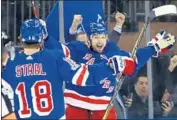  ?? Bruce Bennett ?? RICK NASH CELEBRATES after his go-ahead goal late in the third period for the Rangers.