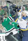  ?? AP ?? The Blues’ Alex Pietrangel­o, right, and the Stars’ Cody Eakin fight.