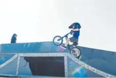  ??  ?? Johnny Cardos, 4, climbs a ramp earlier this month during a practice session at Weaver Hollow Skate Park in Morrison.