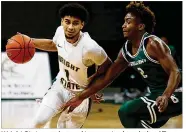  ?? E.L. HUBBARD / CONTRIBUTE­D ?? Wright State coaches and teammates have helped Trey Calvin become a more confident playmaker. “He works really hard on everything,” said Loudon Love, two-time Horizon League player of the year .