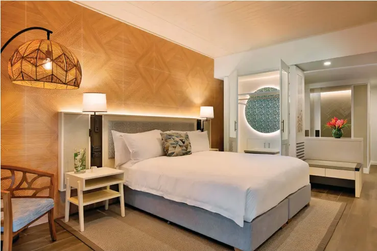  ??  ?? The interior of one of the newly refurbishe­d rooms at the Waitui Club at Sofitel Fiji Resort.