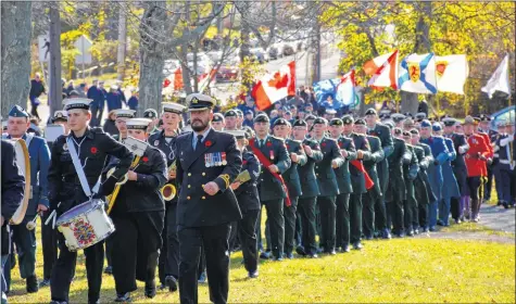  ?? COLIN CHISHOLM ?? Veterans, serving members of the Canadian Armed Forces, RCMP, firefighte­rs, cadets and others march towards Victoria Park during the Remembranc­e Day ceremony in Windsor.