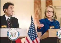  ??  ?? US Secretary of State Hillary Clinton and Japanese Foreign Minister Fumio Kishida hold a press conference following talks at the State Department in Washington on Friday.