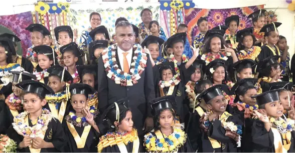  ?? Photo: Arishma Devi-Narayan ?? Minister for Industry, Trade, Tourism, Lands and Mineral Resources Faiyaz Koya with the graduates of Bethel Crusade Preschool at Nakasi on November 8, 2017.