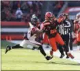  ?? TIM PHILLIS — FOR THE NEWS-HERALD ?? Duke Johnson carries during the Browns’ victory over the Falcons on Nov. 11 at FirstEnerg­y Stadium.