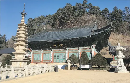  ?? PHOTOS: MICHELLE RICHARDSON ?? Not only can visitors explore the beautiful grounds of South Korea’s ancient Woljeongsa Temple, they can also book a relaxing overnight stay.