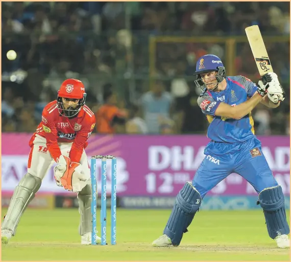  ?? AFP ?? Jos Buttler, right, scored 82 to help Rajasthan Royals put up a target of 159 for Kings XI Punjab in their IPL match yesterday. Report on page 39